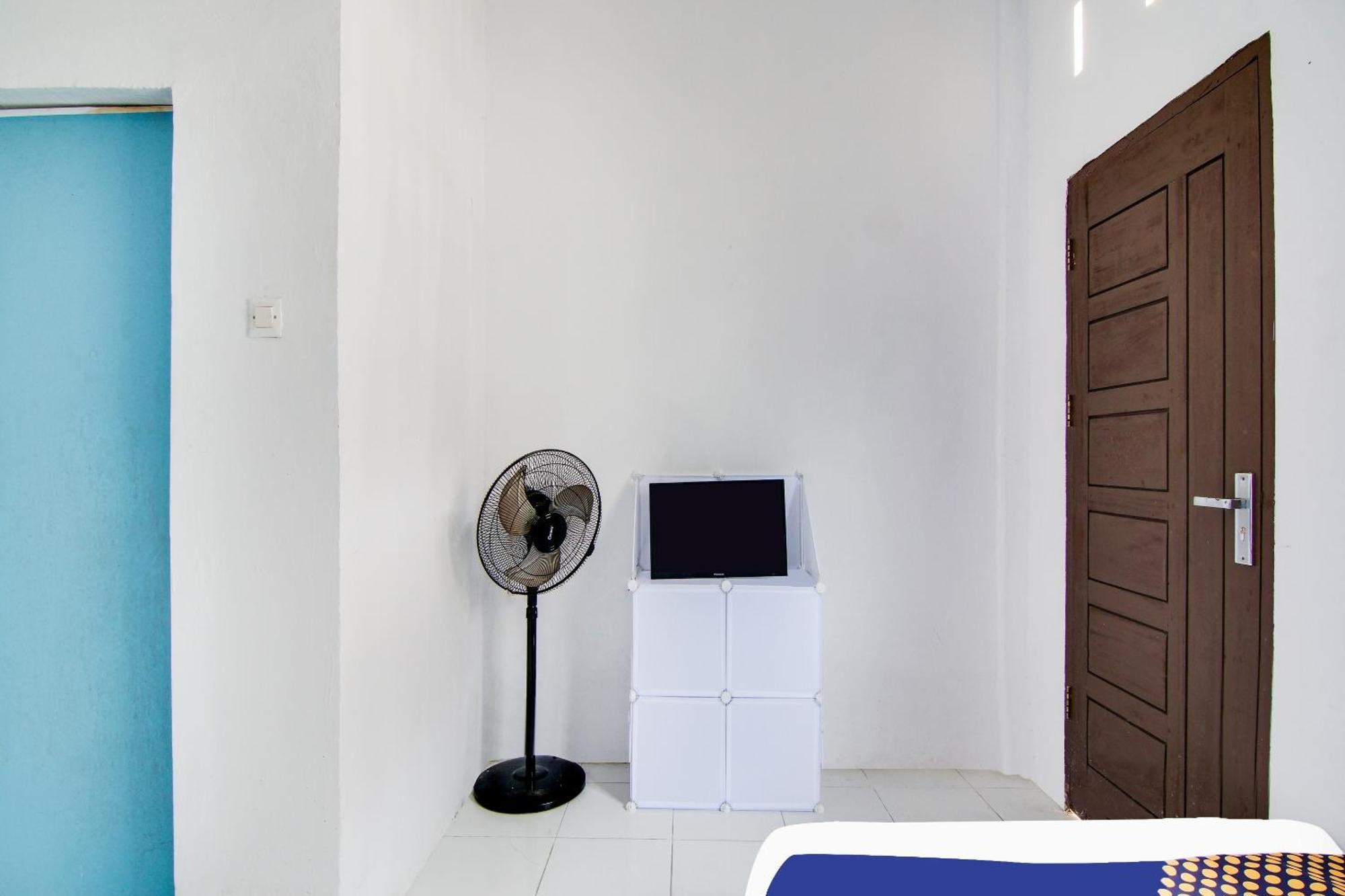 Spot On 91858 Raja Homestay Syariah Pekanbaru Exterior photo